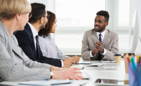 Group of people having a business meeting about the gilts crisis