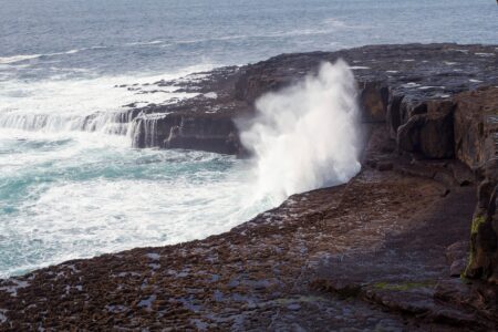 Waves hitting rocks